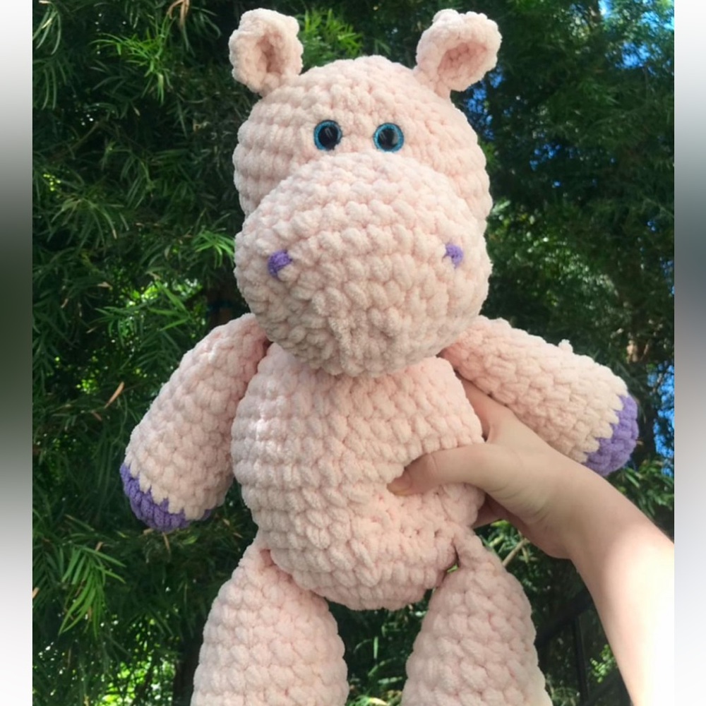 Homemade crochet stuffed animal hippo. Pink and purple
